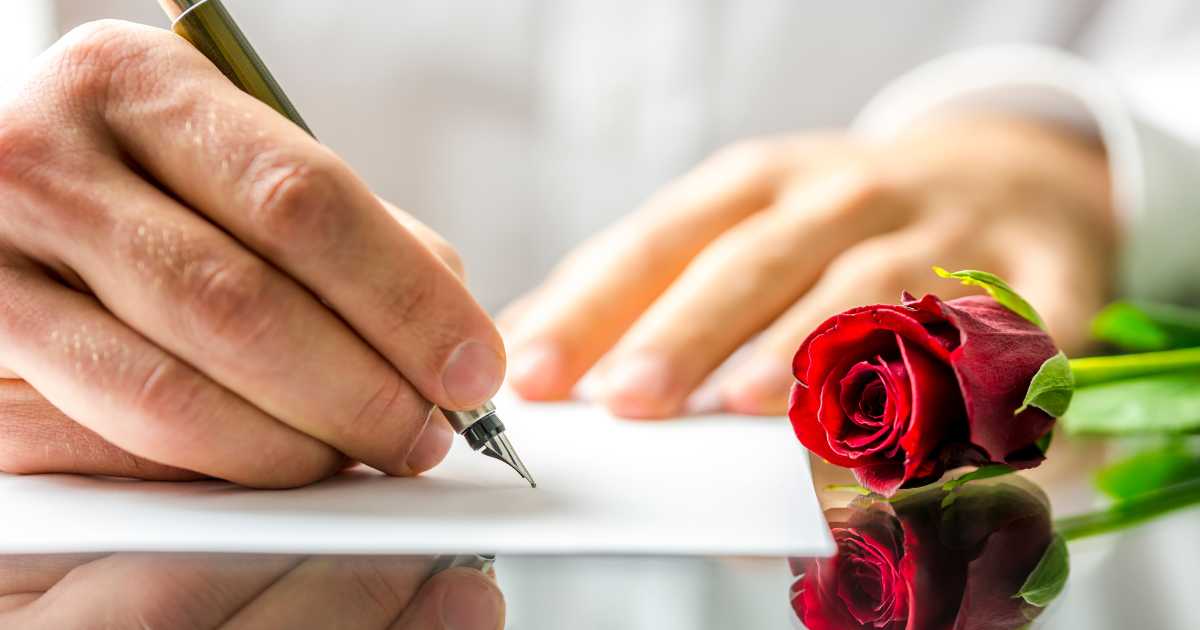 man writing love letter