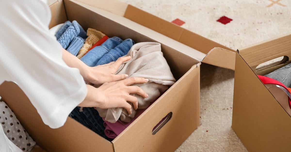 woman packing clothes